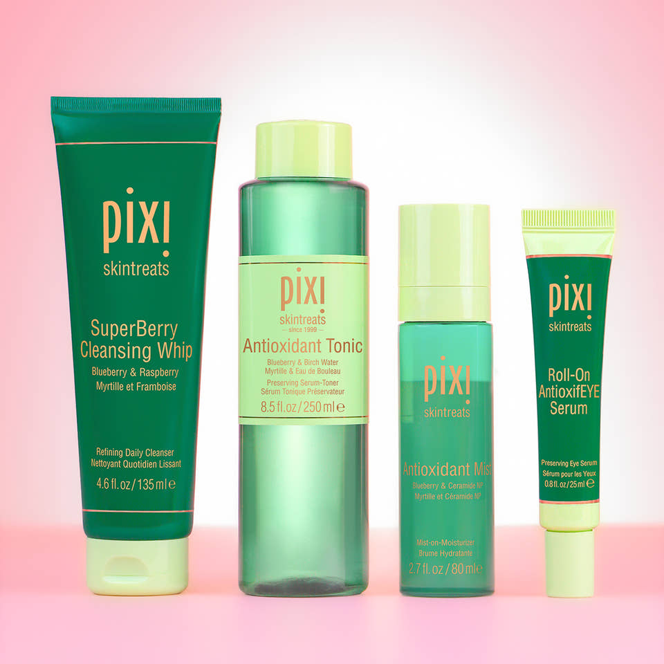 SuperBerry Cleansing Whip, Antioxidant Tonic, Antioxidant Mist and Roll-On AntioxifEYE Serum on pink background. view 1