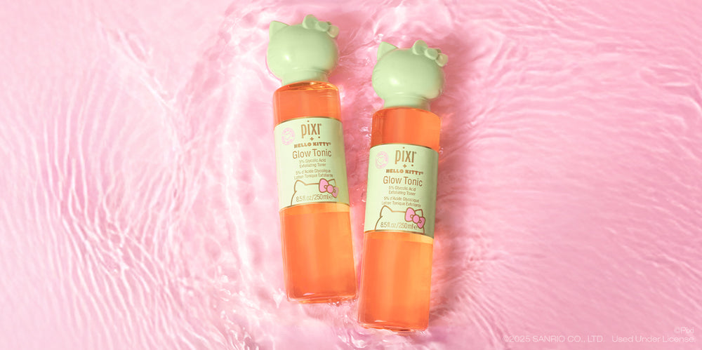 Pixi + Hello Kitty Glow Tonic Original Size shown on a pink background with water