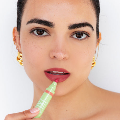 Model wearing LipBlush in shade Purity view 2