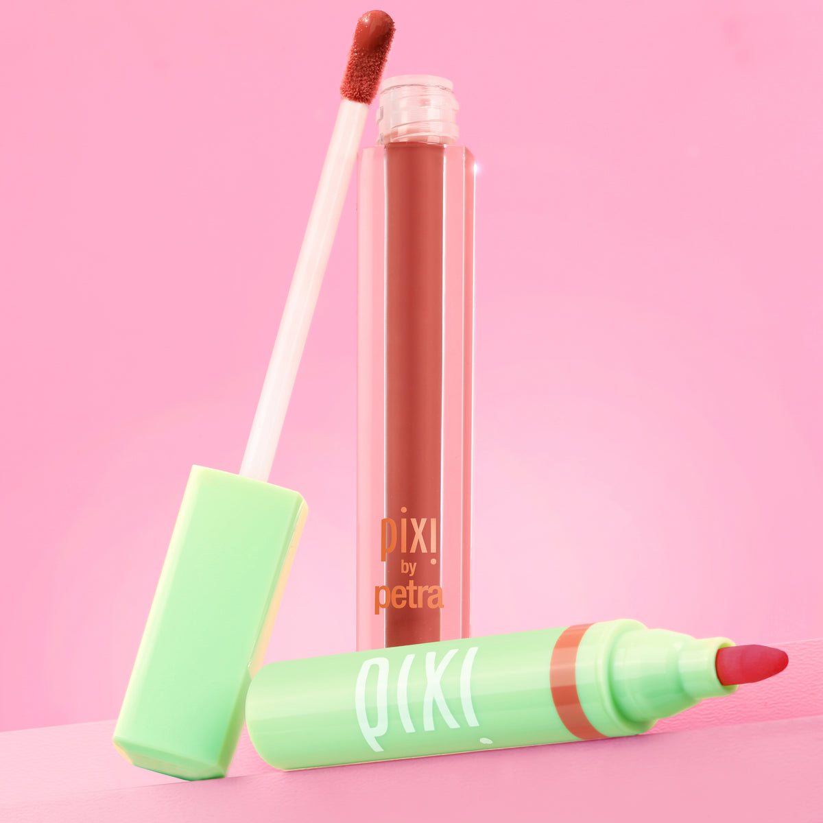 Pixi Signature Duo featuring LipBlush and LipLift Max on a pink background -